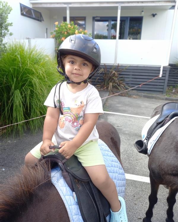 Riding a pony